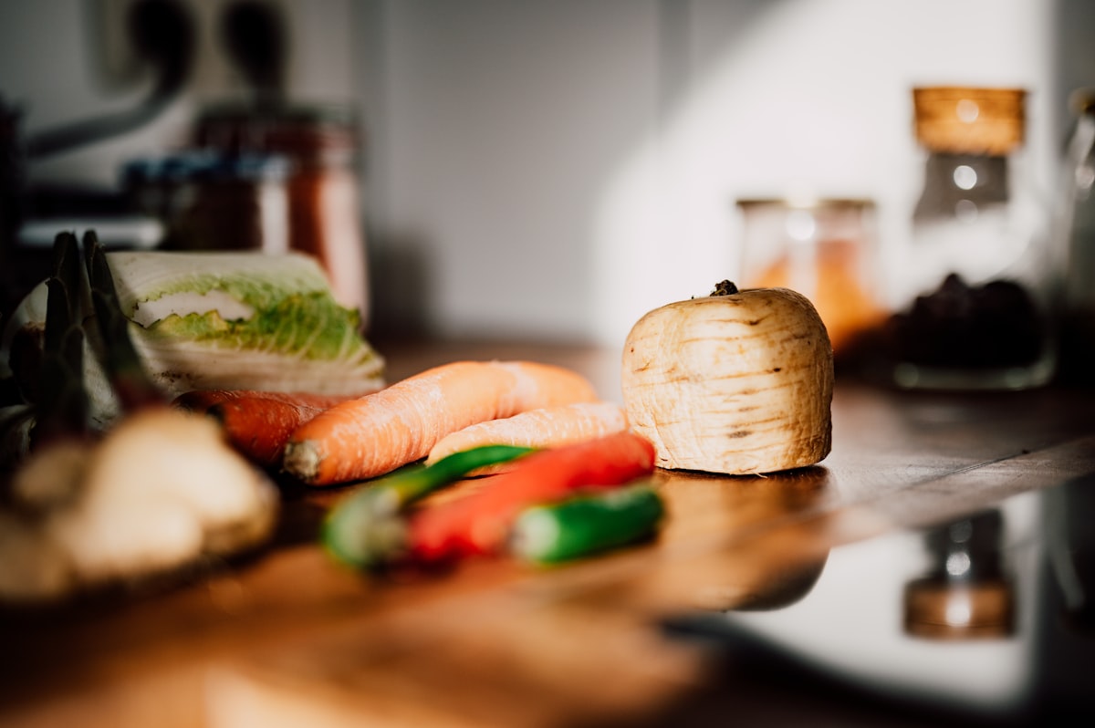 Fresh whole ingredients on wooden surface